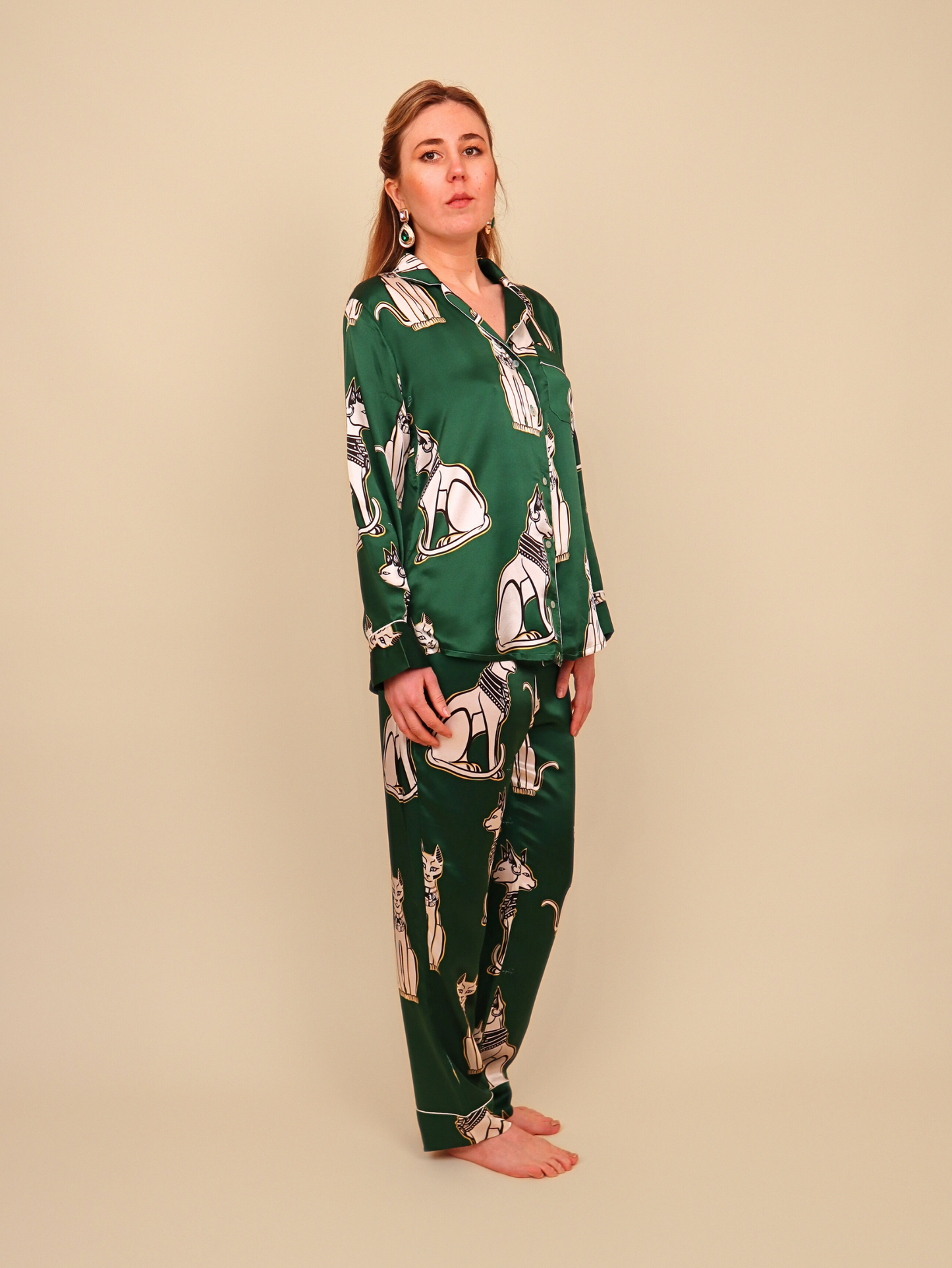 "Emerald green silk pajamas inspired by Bastet, the ancient Egyptian goddess